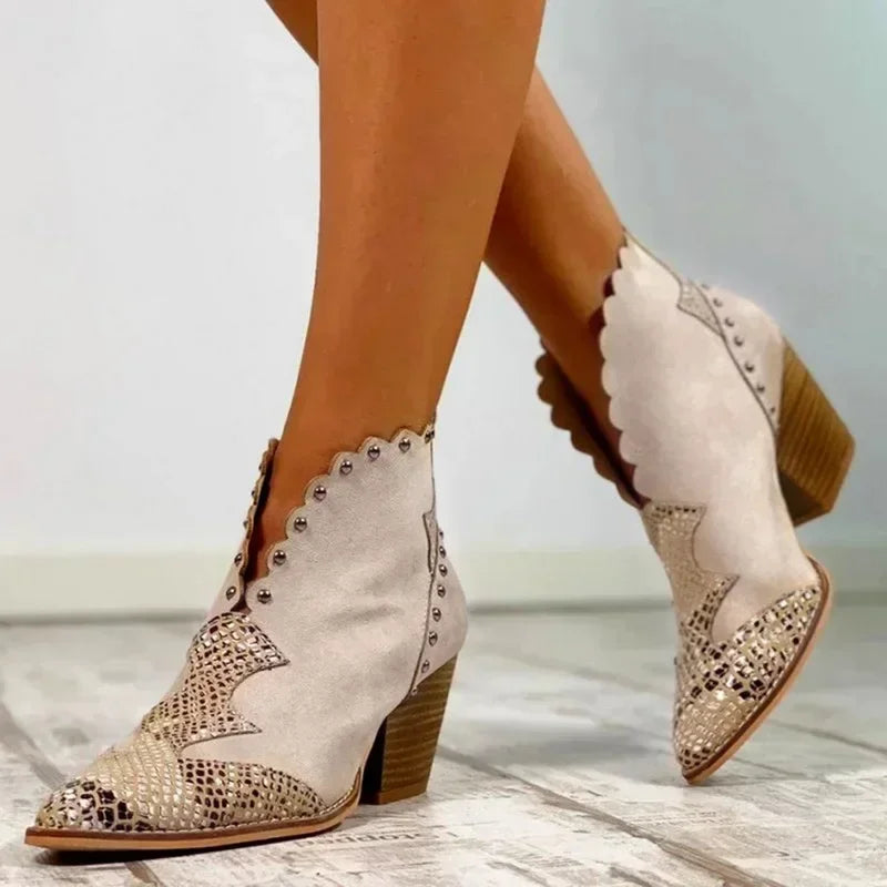 "Women's genuine leather lace-up cowboy boots with a classic Western design, pointed toe, and traditional silhouette."