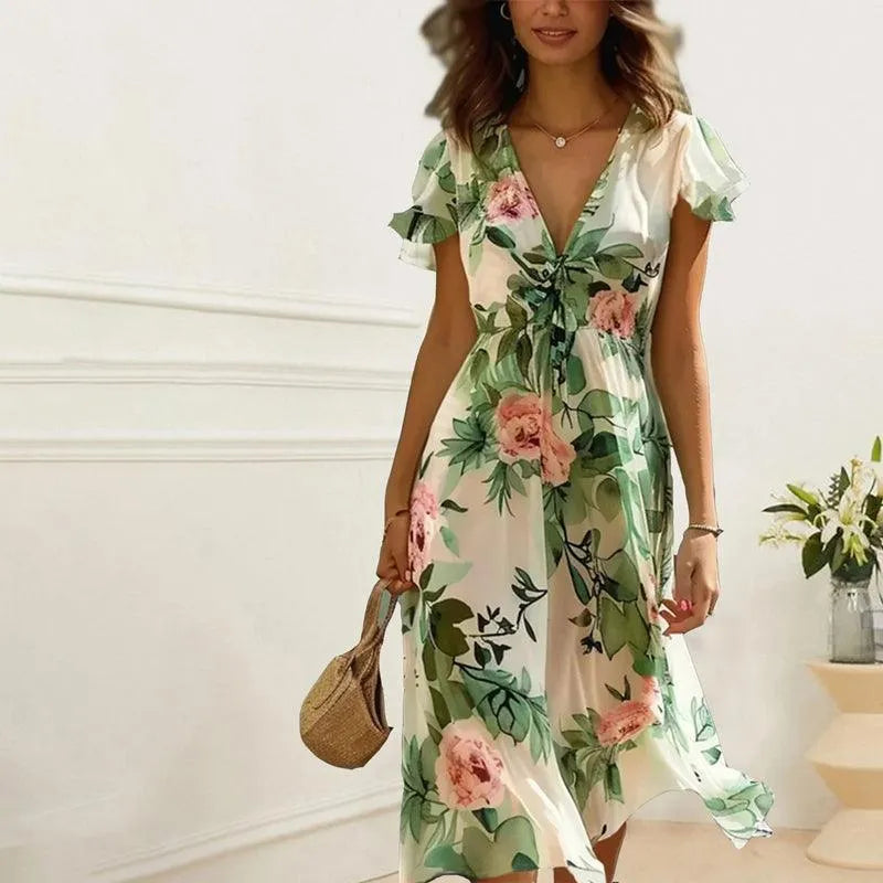 "Women's green floral midi dress with flowy A-line skirt, V-neckline, fitted waist, and flutter sleeves for elegant style"