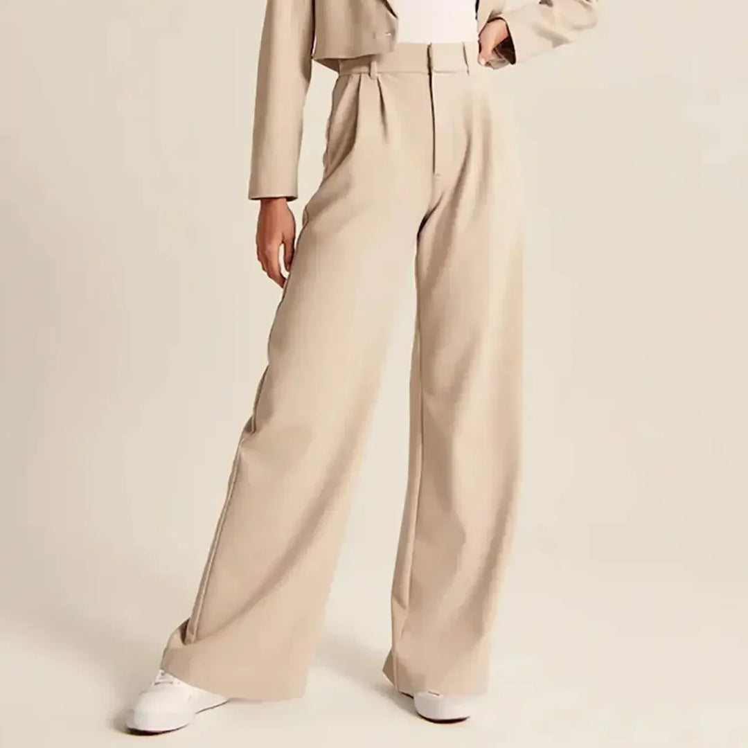 "Women's high-waist wide-leg trousers with pleated front, tailored fit, and soft wool blend for elegant and sophisticated sty