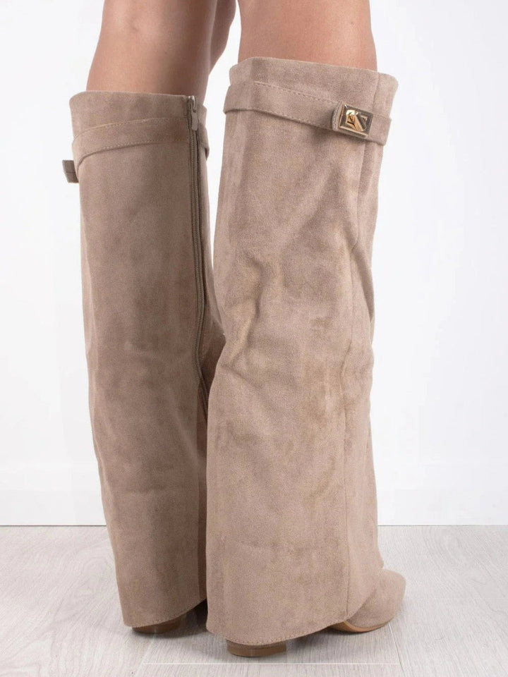 Women's knee-high suede boots with block heel, showing luxury suede material, stylish design, and comfortable fit.