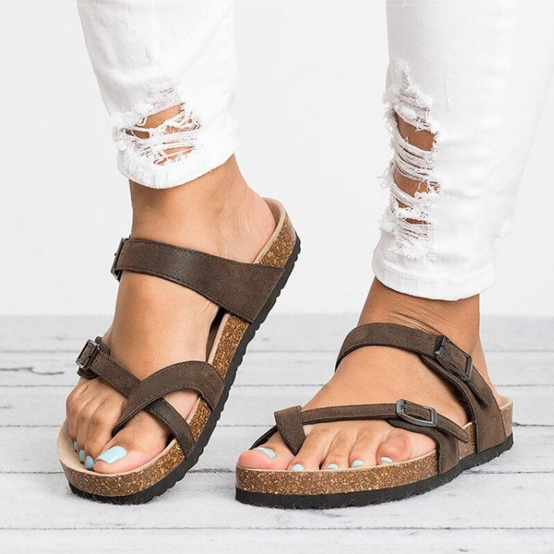 Women's leather adjustable comfort sandals with soft cushioning and straps, available in black and brown for versatile style.