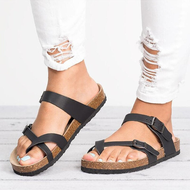 Women's leather adjustable comfort sandals with soft cushioning and straps, available in black and brown for versatile style.