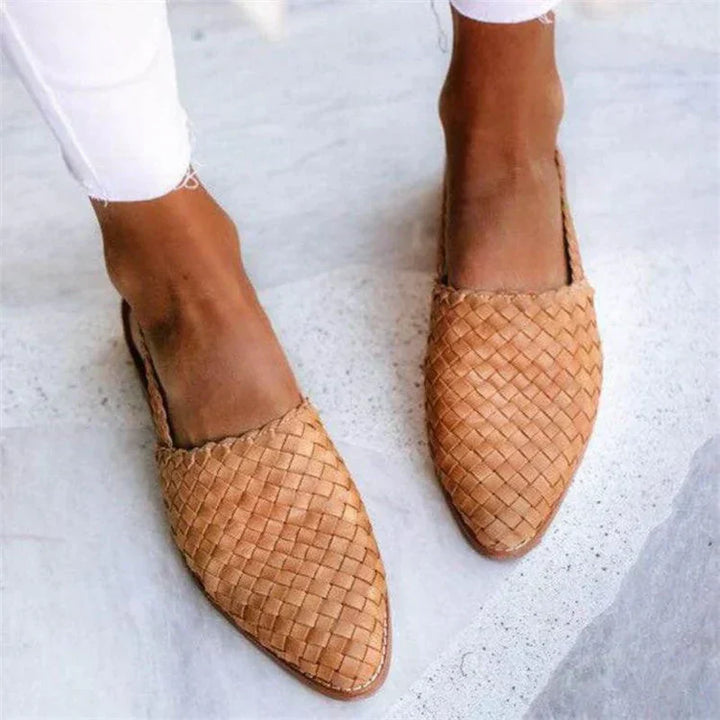 "Women's leather loafers slip-on, braided upper, rounded toe, stylish and comfortable casual footwear for modern women."
