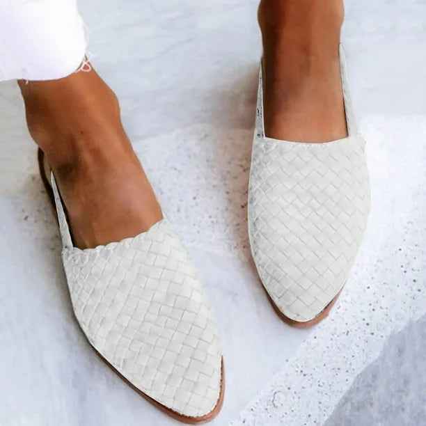 "Women's leather loafers slip-on, braided upper, rounded toe, stylish and comfortable casual footwear for modern women."