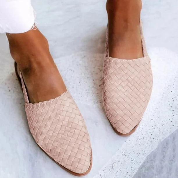 "Women's leather loafers slip-on, braided upper, rounded toe, stylish and comfortable casual footwear for modern women."