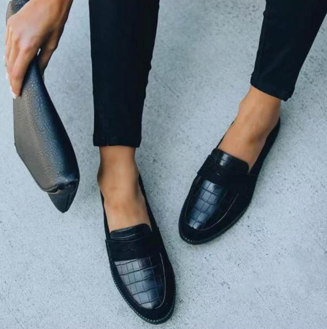 Women's leather loafers with classic silhouette, sleek design, and cushioned insoles for unmatched comfort and elegance.