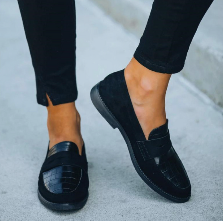 Women's leather loafers with classic silhouette, sleek design, and cushioned insoles for unmatched comfort and elegance.