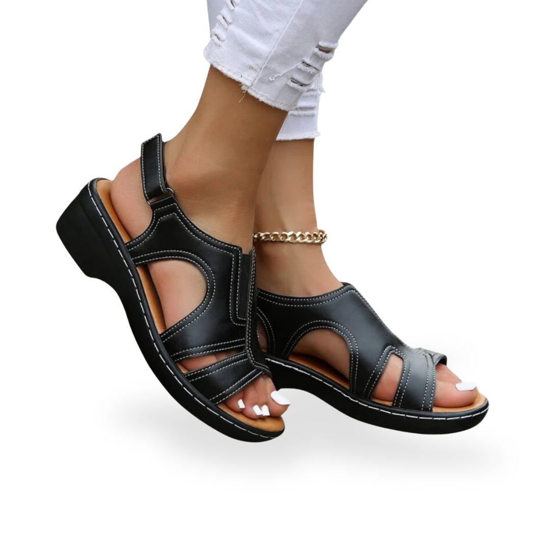 Women's leather orthopedic sandals with adjustable straps, available in black, red, white, brown; comfortable and stylish des