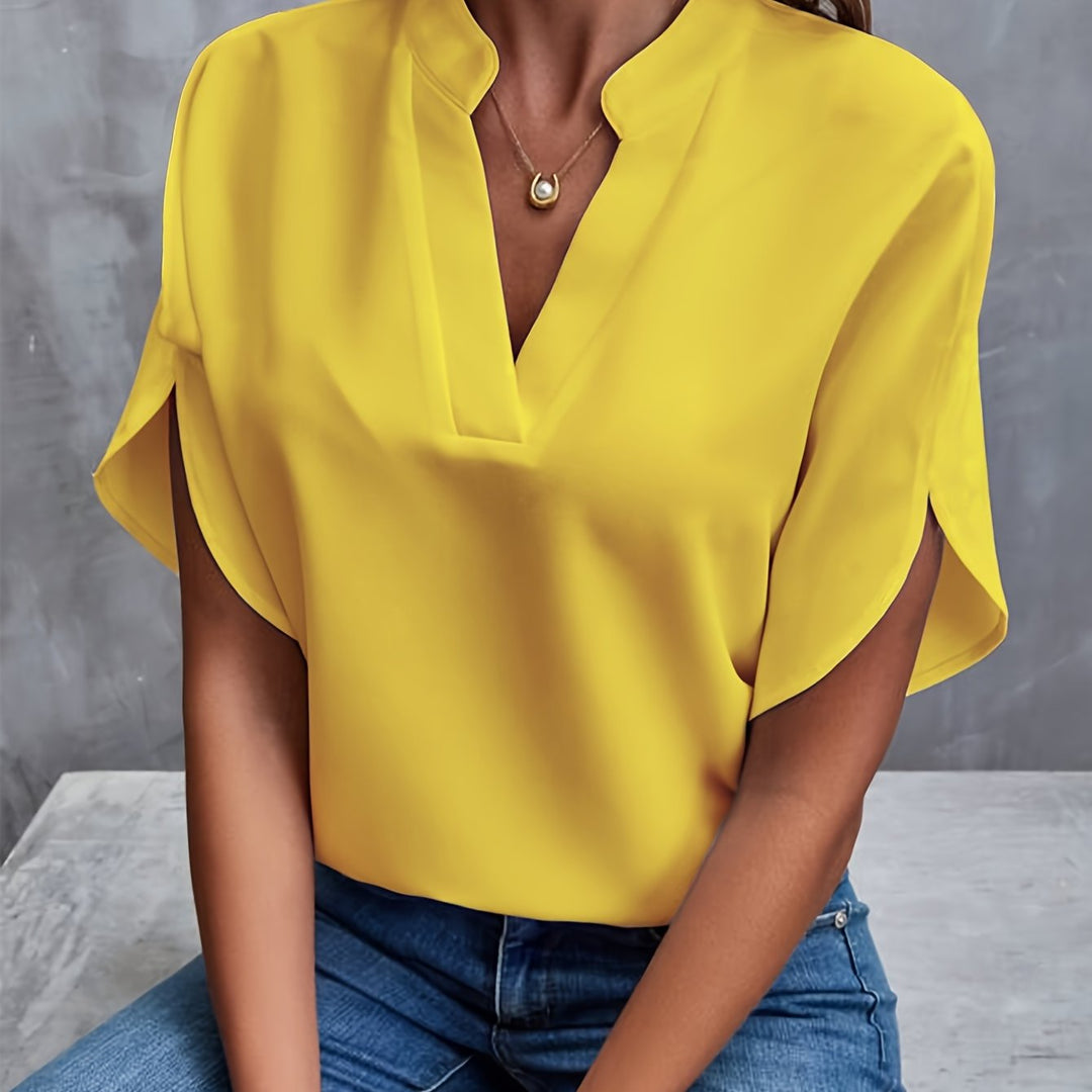 "Women's lightweight elegant blouse with soft drape, relaxed fit, and classic collar, ideal for casual or formal wear."
