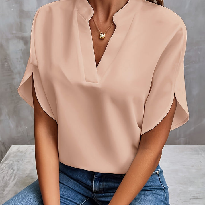 "Women's lightweight elegant blouse with soft drape, relaxed fit, and classic collar, ideal for casual or formal wear."