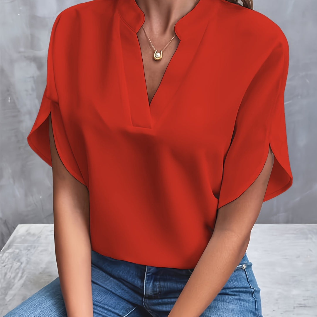 "Women's lightweight elegant blouse with soft drape, relaxed fit, and classic collar, ideal for casual or formal wear."