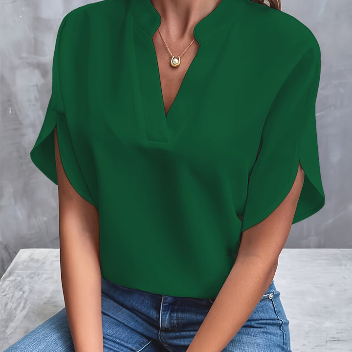 "Women's lightweight elegant blouse with soft drape, relaxed fit, and classic collar, ideal for casual or formal wear."