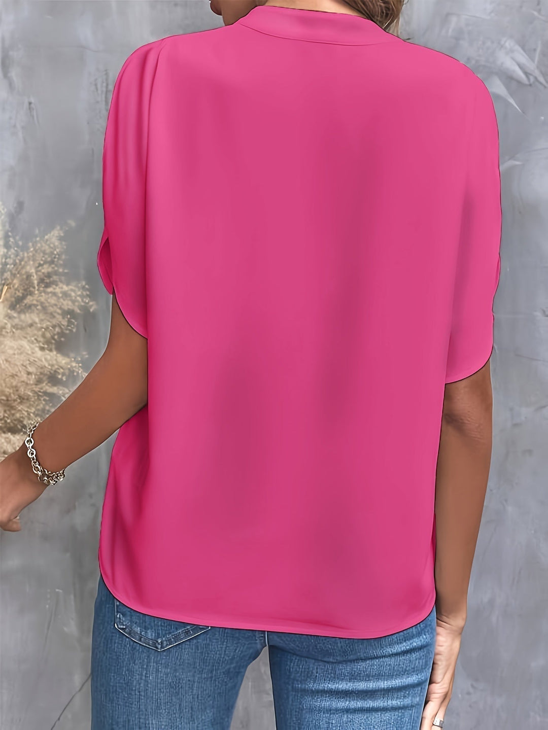"Women's lightweight elegant blouse with soft drape, relaxed fit, and classic collar, ideal for casual or formal wear."