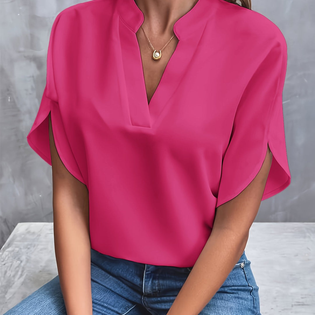 "Women's lightweight elegant blouse with soft drape, relaxed fit, and classic collar, ideal for casual or formal wear."