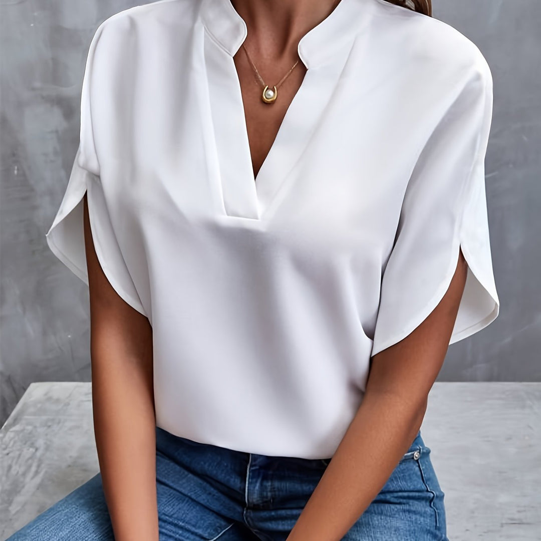 "Women's lightweight elegant blouse with soft drape, relaxed fit, and classic collar, ideal for casual or formal wear."