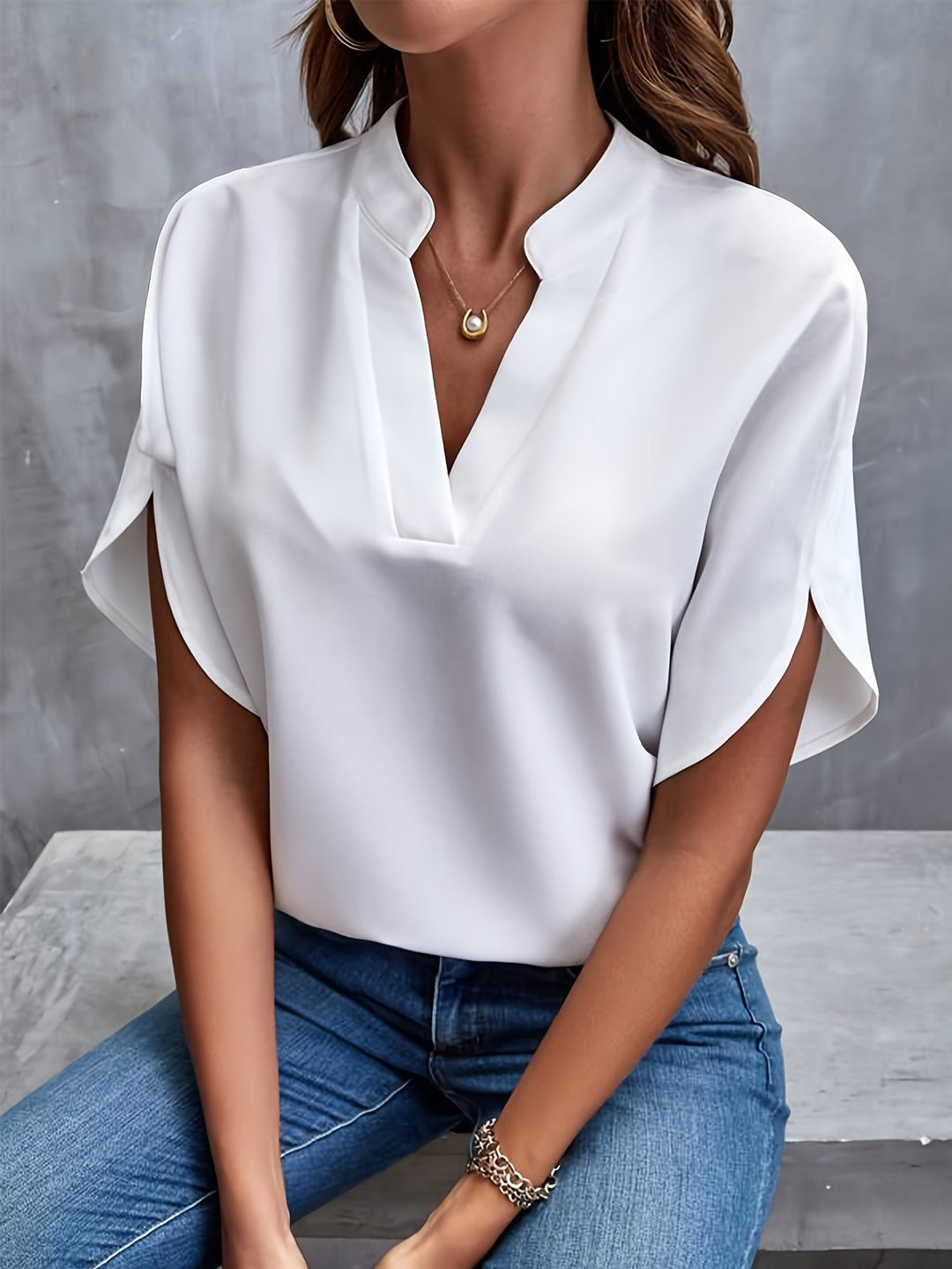 "Women's lightweight elegant blouse with soft drape, relaxed fit, and classic collar, ideal for casual or formal wear."