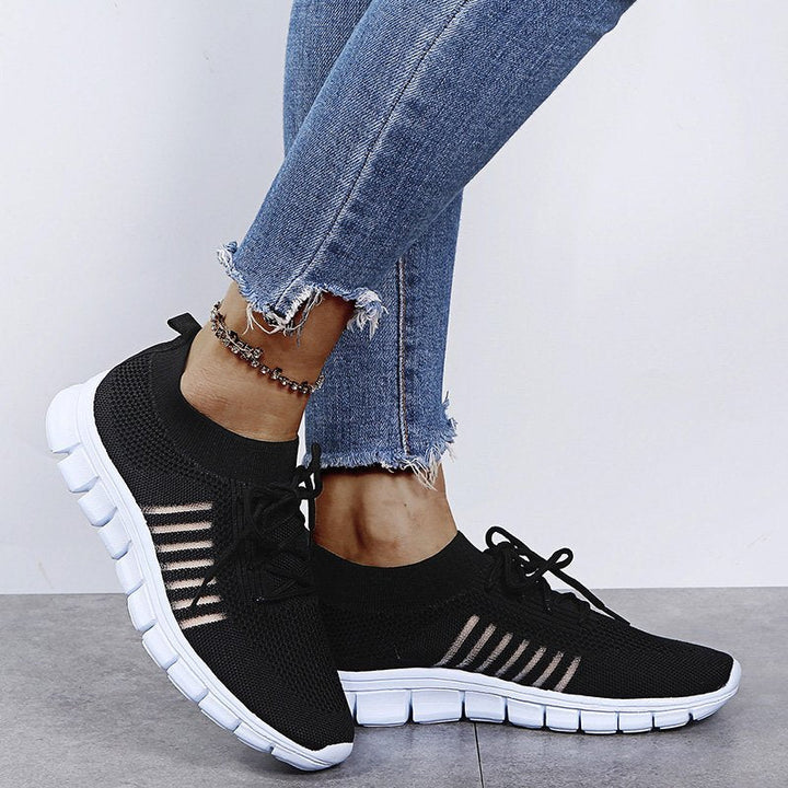 Women's lightweight walking sneakers with breathable mesh, cushioned sole, slip-resistant, ideal for comfort and style.