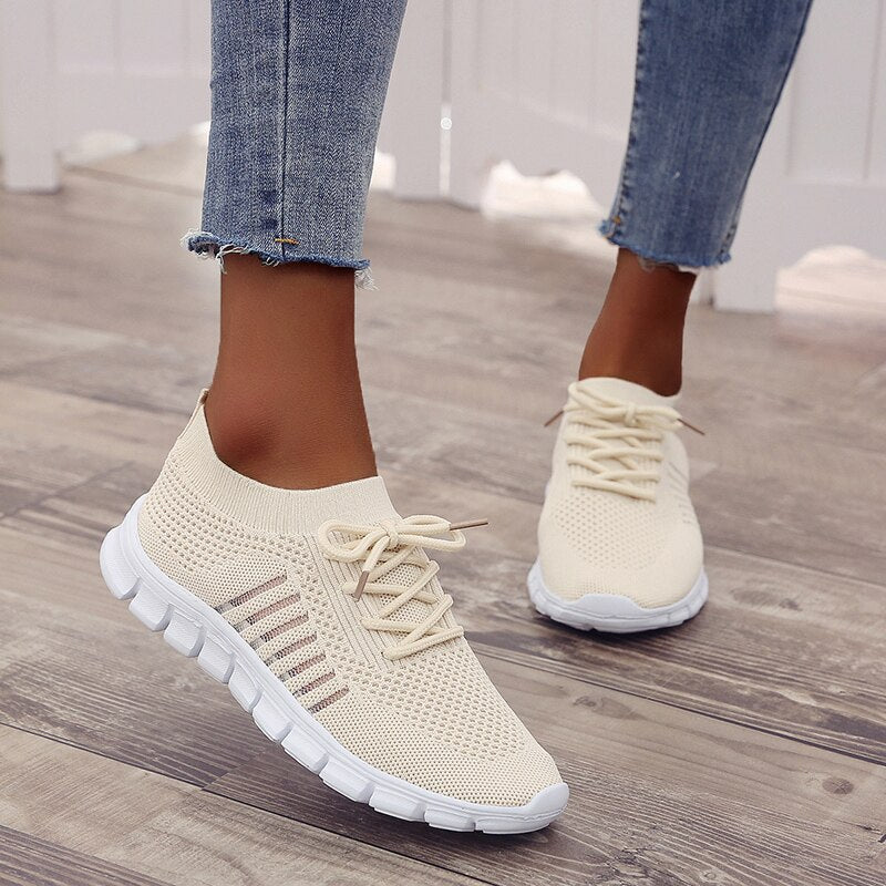 Women's lightweight walking sneakers with breathable mesh, cushioned sole, slip-resistant, ideal for comfort and style.
