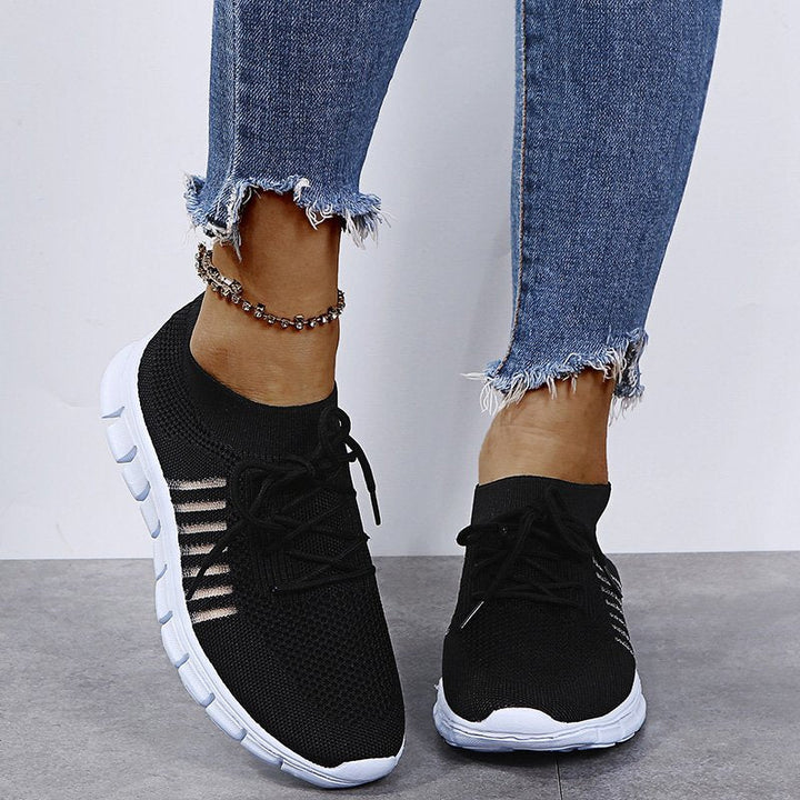 Women's lightweight walking sneakers with breathable mesh, cushioned sole, slip-resistant, ideal for comfort and style.