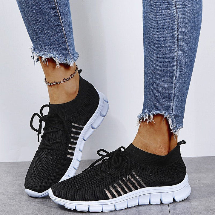Women's lightweight walking sneakers with breathable mesh, cushioned sole, slip-resistant, ideal for comfort and style.