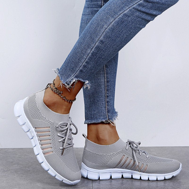 Women's lightweight walking sneakers with breathable mesh, cushioned sole, slip-resistant, ideal for comfort and style.