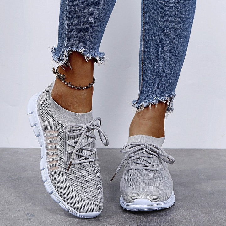 Women's lightweight walking sneakers with breathable mesh, cushioned sole, slip-resistant, ideal for comfort and style.