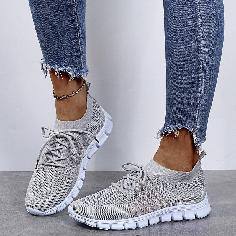 Women's lightweight walking sneakers with breathable mesh, cushioned sole, slip-resistant, ideal for comfort and style.