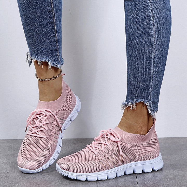 Women's lightweight walking sneakers with breathable mesh, cushioned sole, slip-resistant, ideal for comfort and style.
