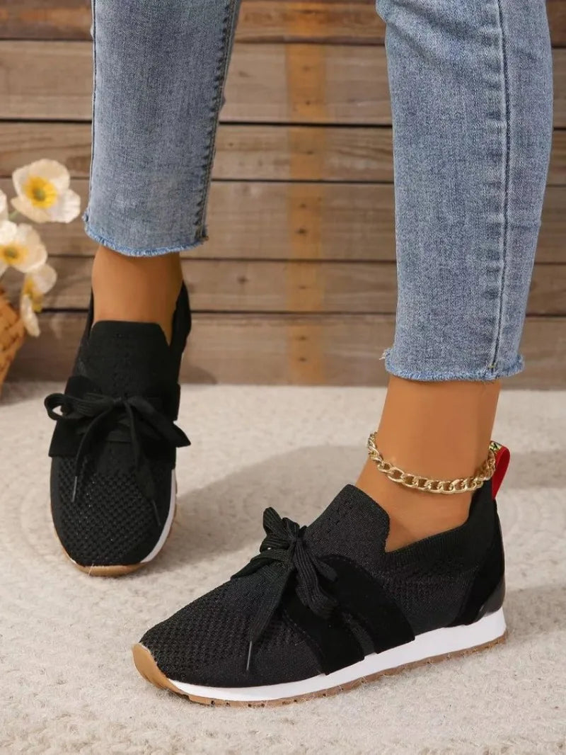 "Women's lightweight walking sneakers with breathable mesh upper, soft cushioning, and supportive natural flex sole"