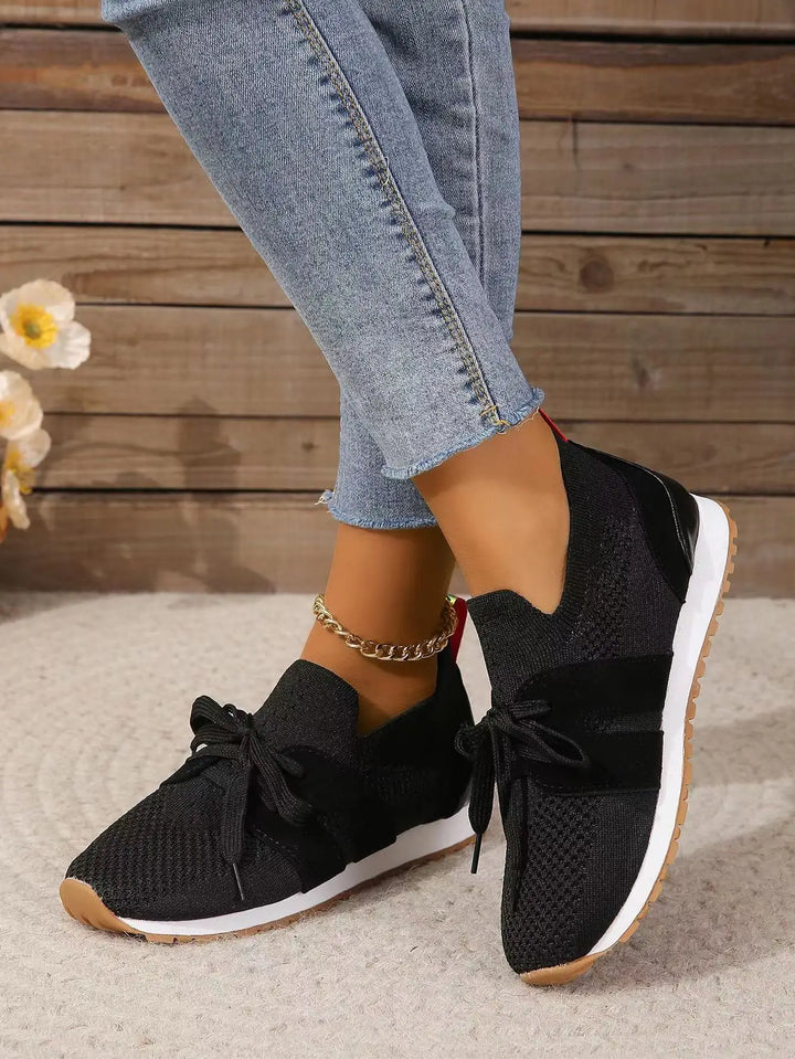"Women's lightweight walking sneakers with breathable mesh upper, soft cushioning, and supportive natural flex sole"