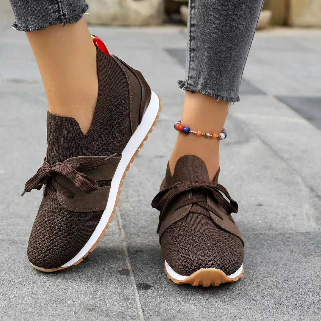 "Women's lightweight walking sneakers with breathable mesh upper, soft cushioning, and supportive natural flex sole"