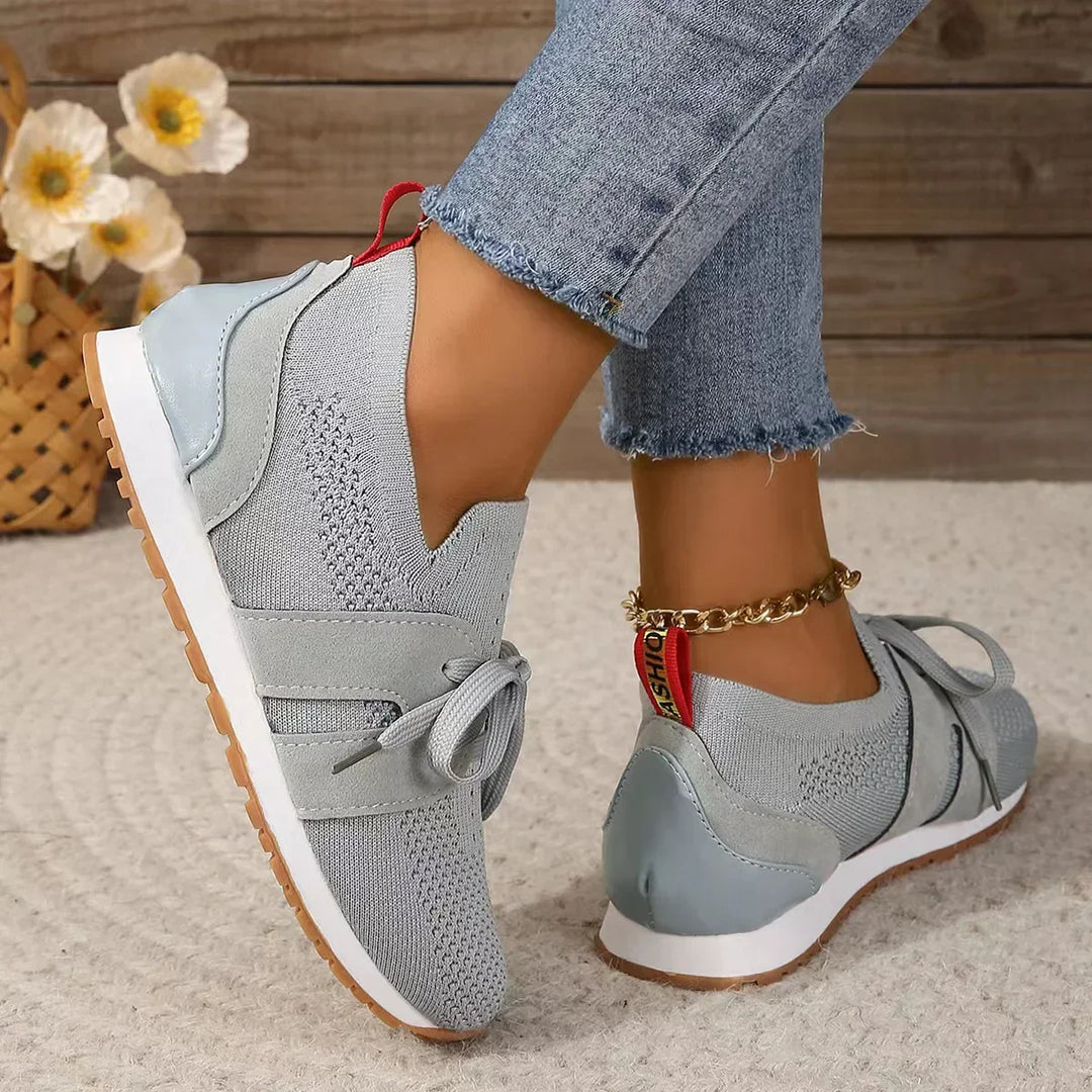 "Women's lightweight walking sneakers with breathable mesh upper, soft cushioning, and supportive natural flex sole"