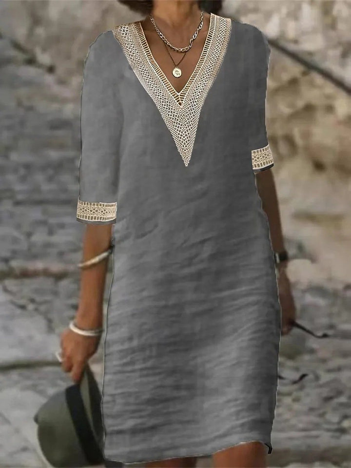 Women's linen blend V-neck dress with lace trim, 3/4 sleeves, relaxed fit, perfect for casual and elegant wear.