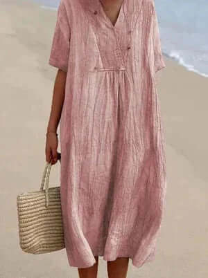 "Women's linen cotton summer dress, airy and breathable in pink, stylish modern silhouette, perfect for warm days."