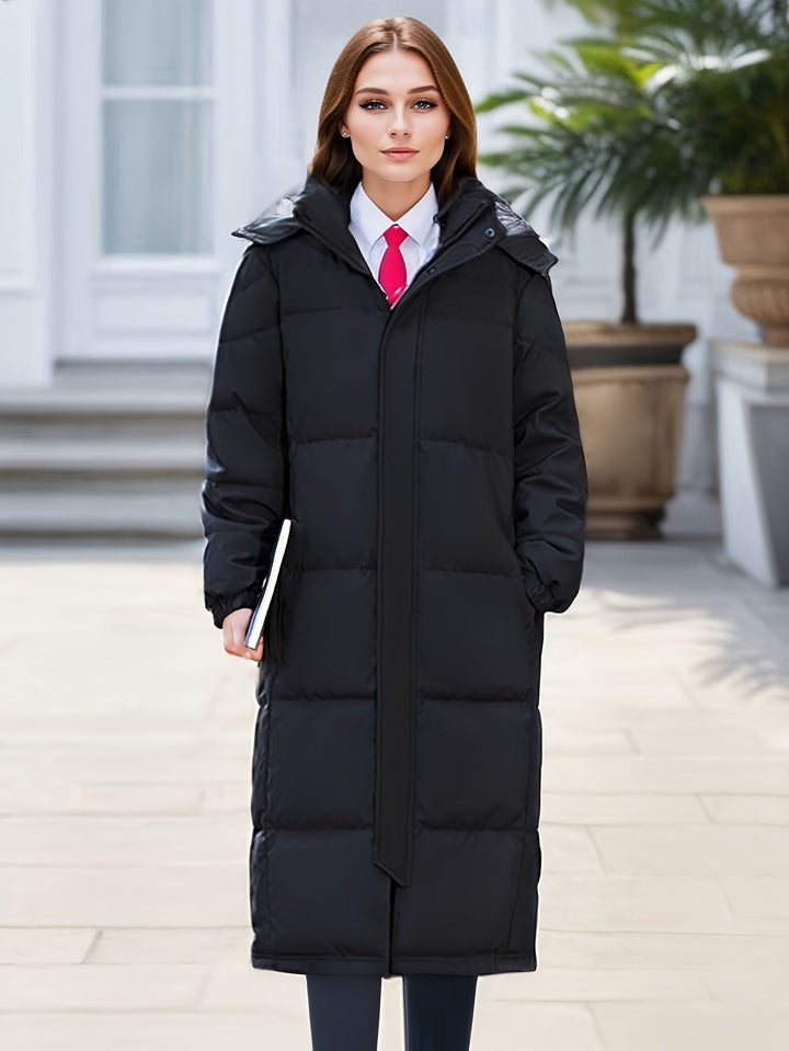 Women's long down coat with hood for autumn/winter; solid pattern, padded for warmth, chic and versatile style.