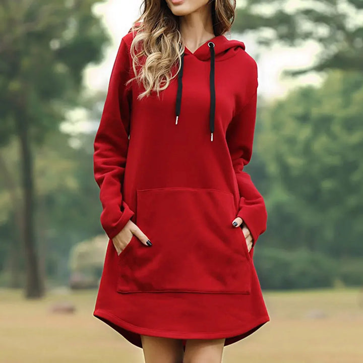"Women's long style hoodie with relaxed fit, cozy soft fabric, ideal for fall and winter, showcasing trendy casual design."