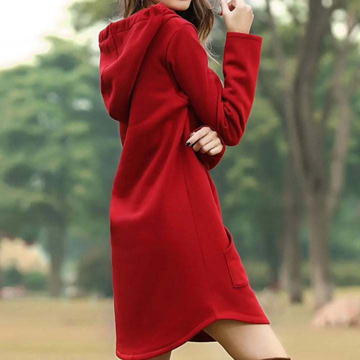 "Women's long style hoodie with relaxed fit, cozy soft fabric, ideal for fall and winter, showcasing trendy casual design."