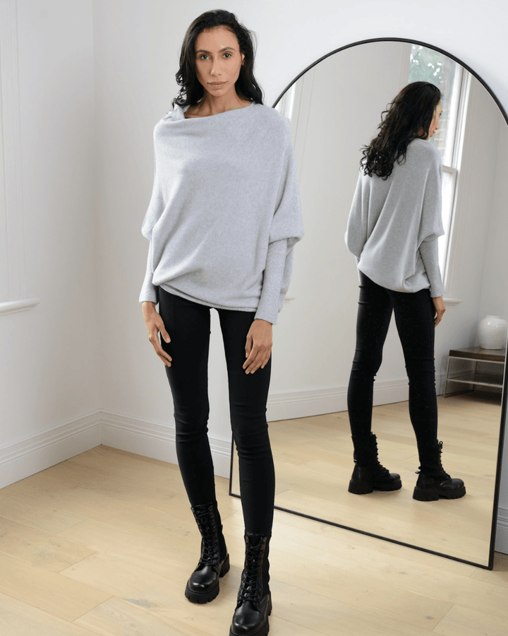 "Womens loose sweater with classic design, luxurious fit; available in beige, gray, black, green, purple, and more colors."