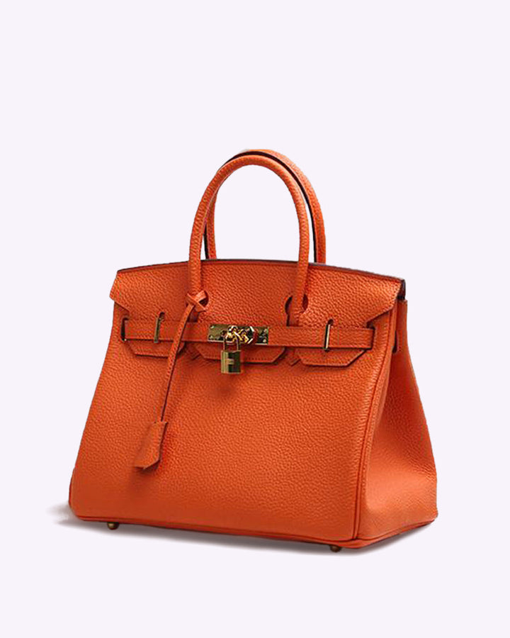 Women's luxury leather shoulder bag; elegant brown design with adjustable strap, perfect for any occasion; timeless style.