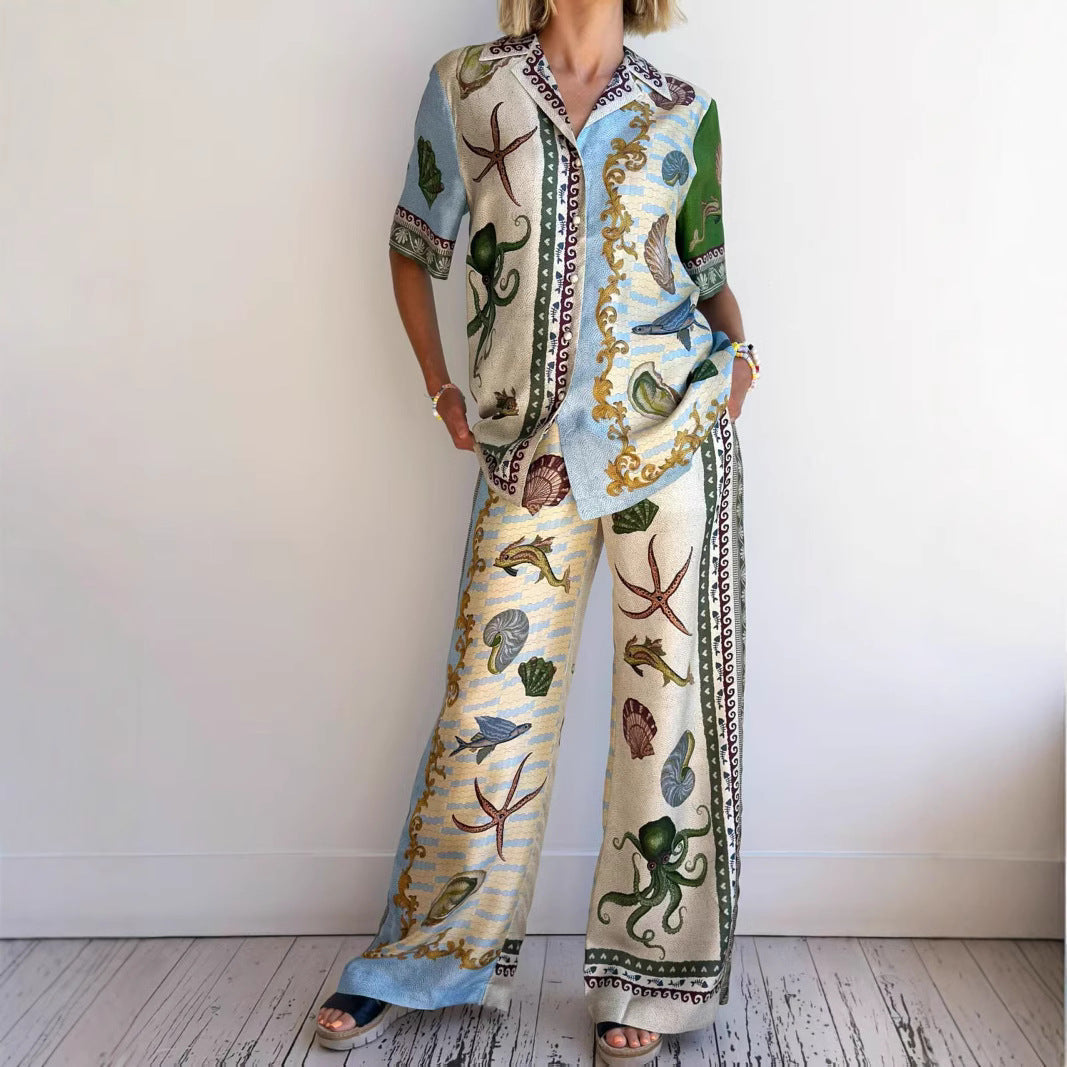 Women's marine print linen blend set with a relaxed shirt and wide-leg pants, ideal for casual or beach occasions.