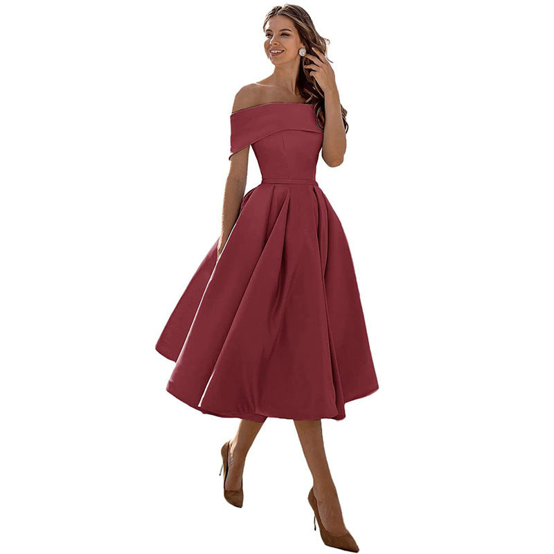 Women's off-shoulder A-line dress with flared skirt, elegant silhouette, perfect for formal events, showcases chic style.