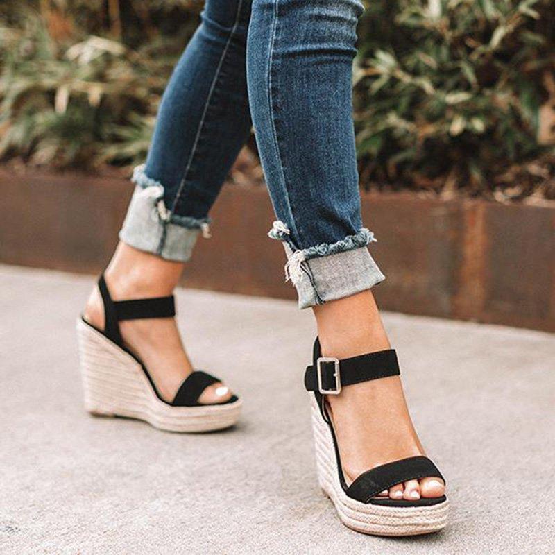Women's open-toe ankle strap wedge sandals, chic design, versatile summer footwear, day-to-night elegance and comfort.