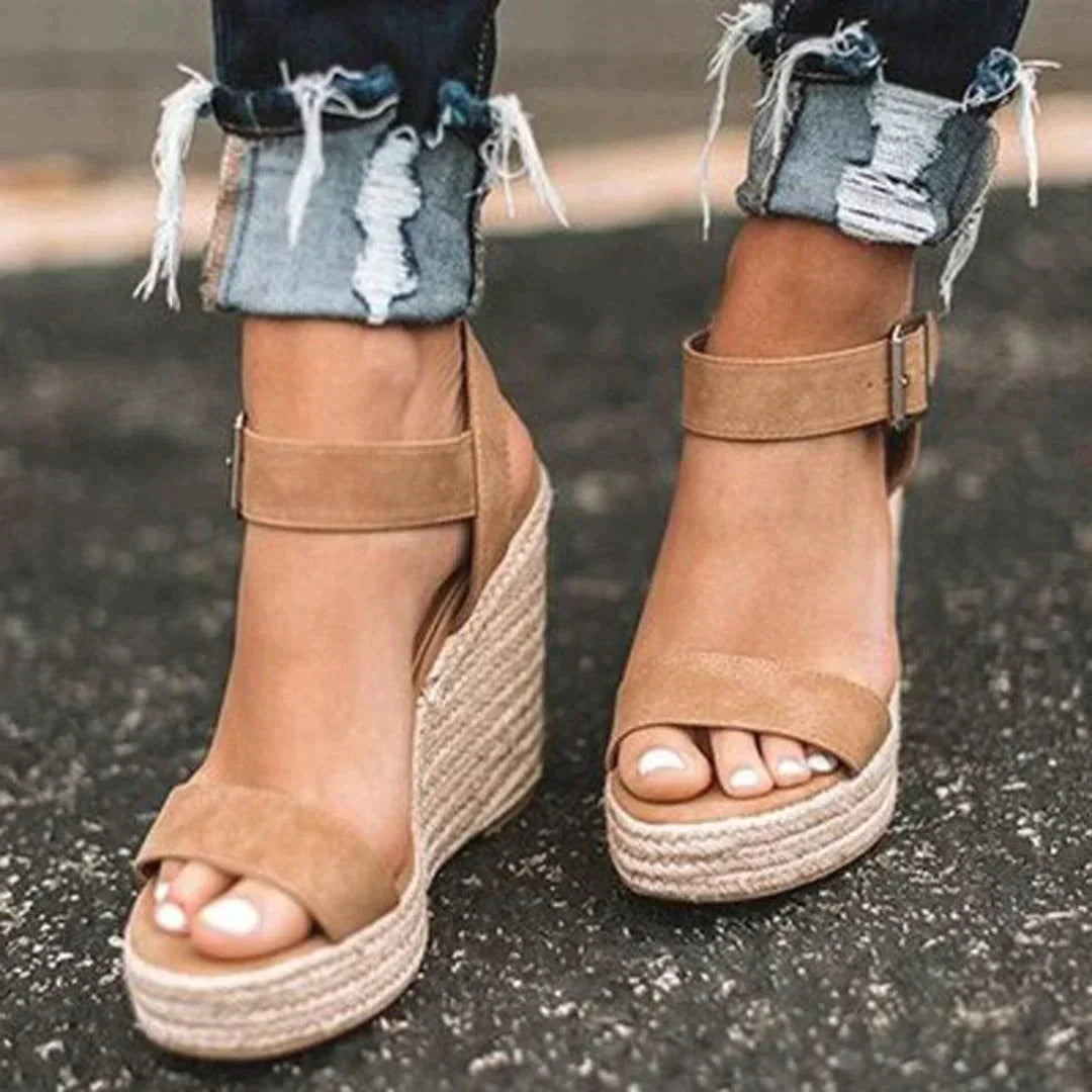 "Women's open-toe espadrille wedge sandals with ankle strap, faux leather upper, and woven wedge, ideal for summer style."