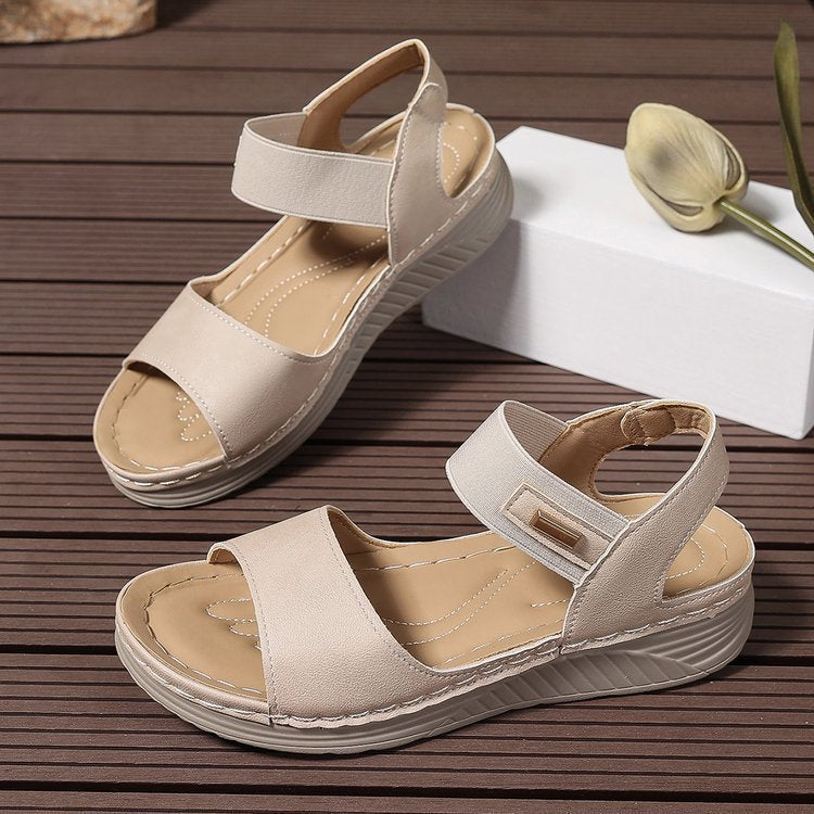Women's open toe slip-on sandals with ankle strap, cushioned footbed, high-quality PU leather, perfect for sunny days.