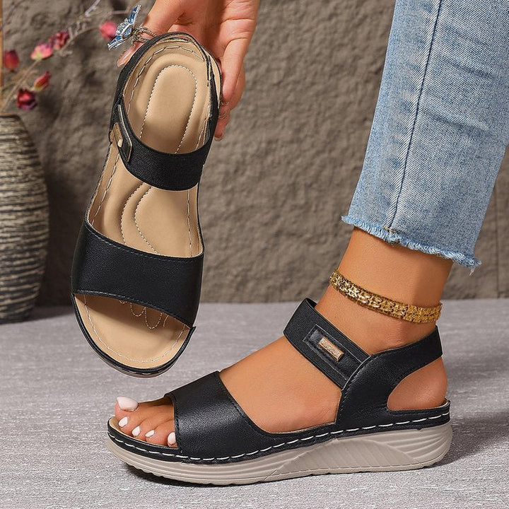 Women's open toe slip-on sandals with ankle strap, cushioned footbed, high-quality PU leather, perfect for sunny days.
