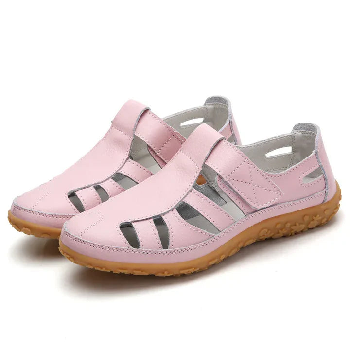 Women's orthopedic anti-slip sandals with adjustable straps in black, offering superior arch support and breathable design.