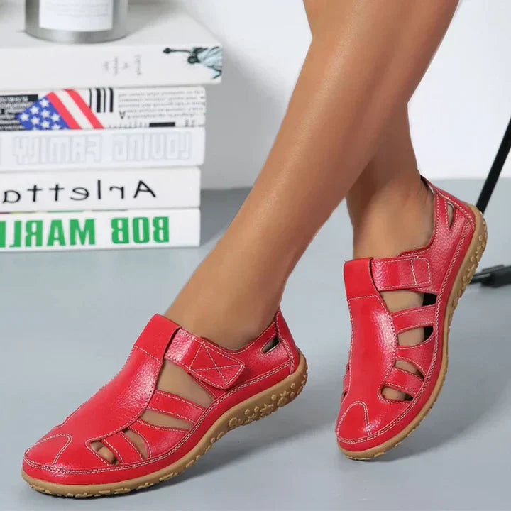 Women's orthopedic anti-slip sandals with adjustable straps in black, offering superior arch support and breathable design.