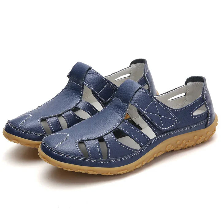 Women's orthopedic anti-slip sandals with adjustable straps in black, offering superior arch support and breathable design.