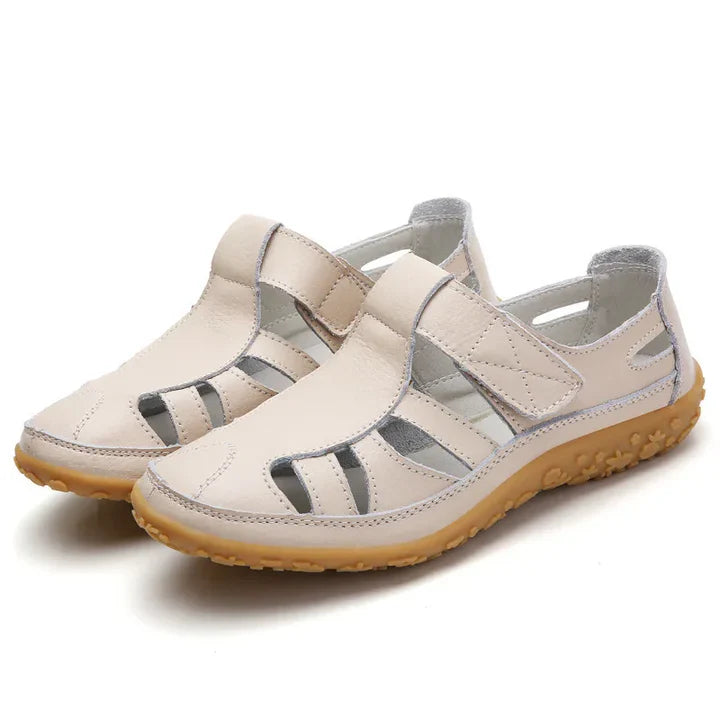 Women's orthopedic anti-slip sandals with adjustable straps in black, offering superior arch support and breathable design.