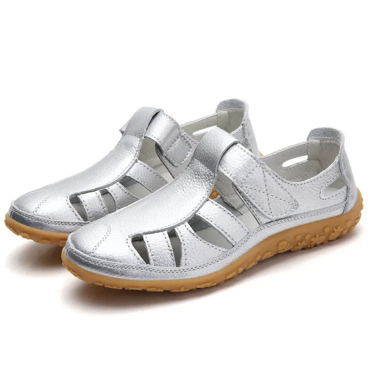 Women's orthopedic anti-slip sandals with adjustable straps in black, offering superior arch support and breathable design.